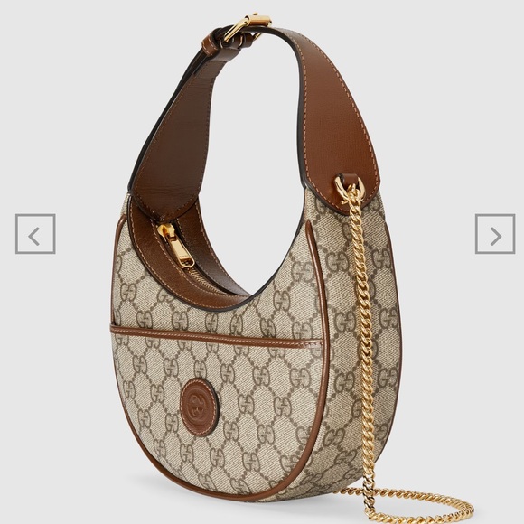 GUCCI HALF-MOON-SHAPED MINI BAG WITH INTERLOCKING G - Picture 1 of 10